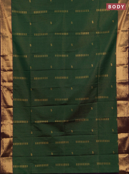 Semi soft silk saree green and purple with allover zari checks & buttas and rich zari woven border