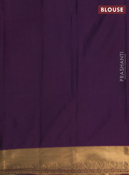 Semi soft silk saree green and purple with allover zari checks & buttas and rich zari woven border