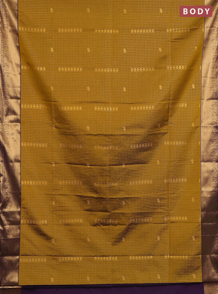 Semi soft silk saree dark mustard and purple with allover zari checks & buttas and rich zari woven border