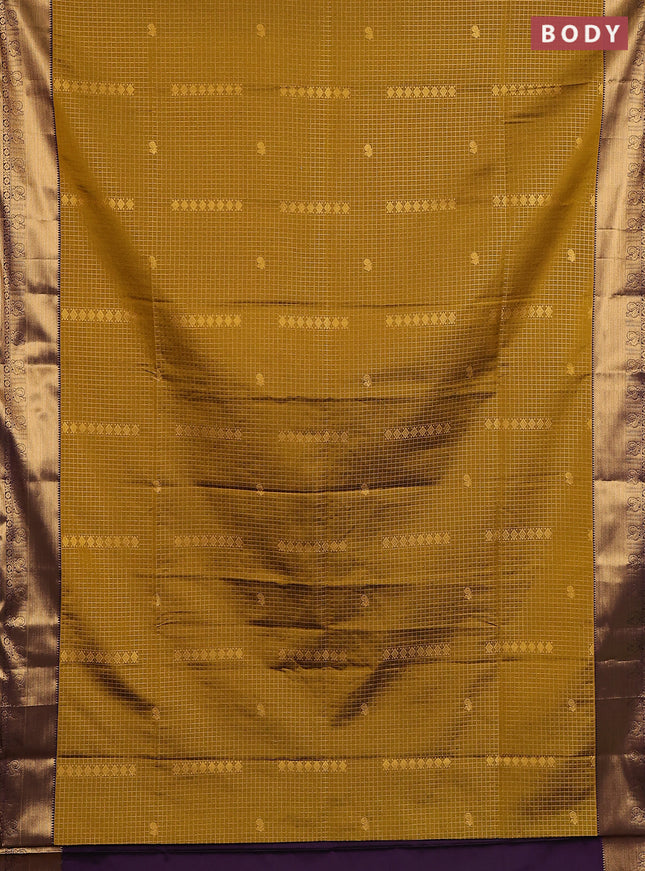 Semi soft silk saree dark mustard and purple with allover zari checks & buttas and rich zari woven border