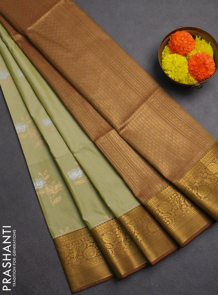 Semi soft silk saree pastel green and mehendi green with silver & gold zari woven buttas and zari woven border