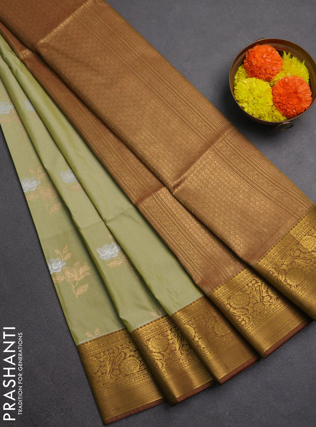 Semi soft silk saree pastel green and mehendi green with silver & gold zari woven buttas and zari woven border
