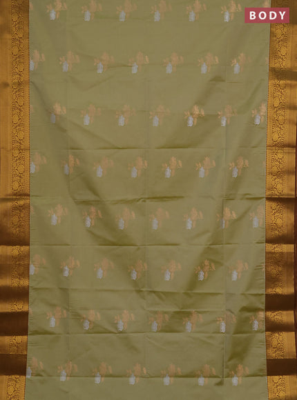 Semi soft silk saree pastel green and mehendi green with silver & gold zari woven buttas and zari woven border