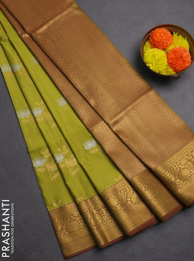 Semi soft silk saree lime green and mehendi green with silver & gold zari woven buttas and zari woven border