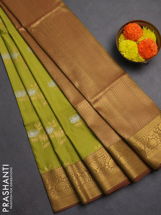 Semi soft silk saree lime green and mehendi green with silver & gold zari woven buttas and zari woven border