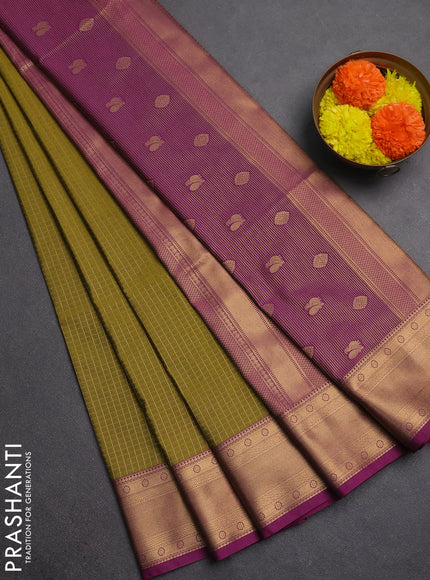 Semi soft silk saree mehendi green and magenta pink with allover zari checks & buttas and zari woven border