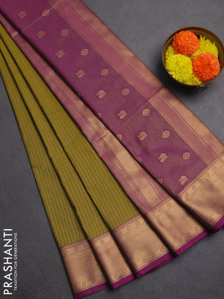 Semi soft silk saree mehendi green and magenta pink with allover zari checks & buttas and zari woven border