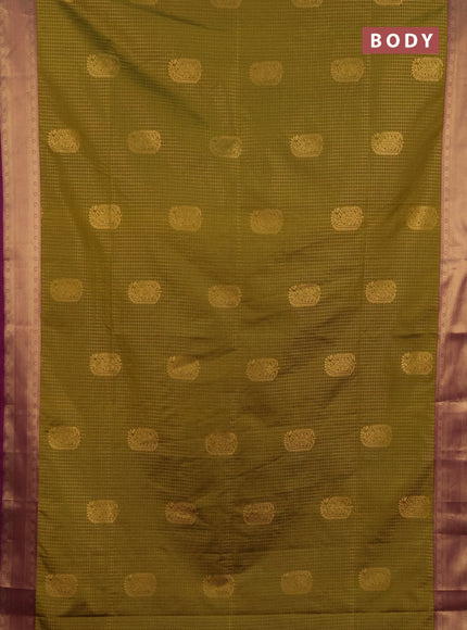 Semi soft silk saree mehendi green and magenta pink with allover zari checks & buttas and zari woven border