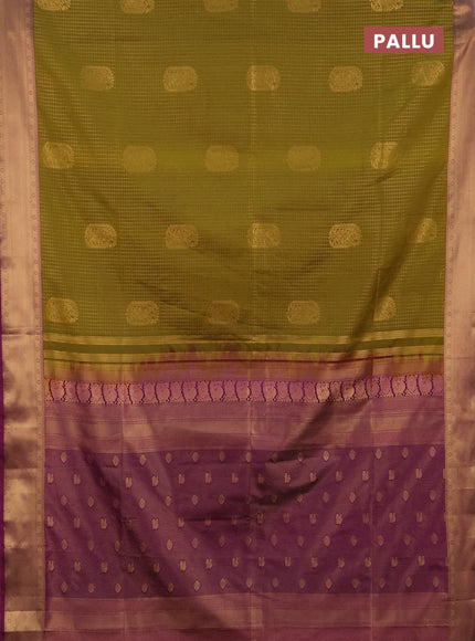 Semi soft silk saree mehendi green and magenta pink with allover zari checks & buttas and zari woven border