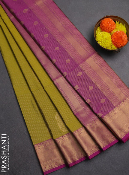 Semi soft silk saree mustard green and magenta pink with allover zari checks & buttas and zari woven border