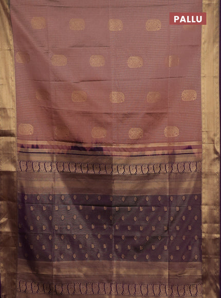 Semi soft silk saree peach shade and purple with allover zari checks & buttas and zari woven border