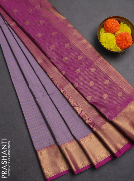 Semi soft silk saree lavender and magenta pink with allover zari checks & buttas and zari woven border