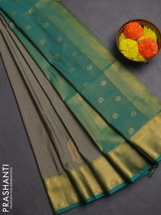Semi soft silk saree grey and teal green with allover zari checks & buttas and zari woven border