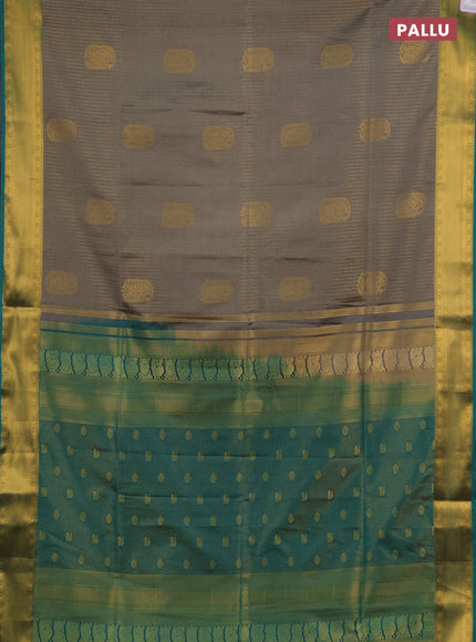 Semi soft silk saree grey and teal green with allover zari checks & buttas and zari woven border
