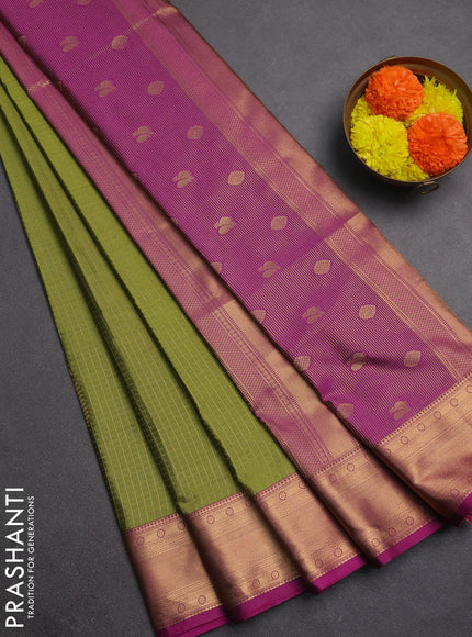 Semi soft silk saree mehendi green and magenta pink with allover zari checks & buttas and zari woven border