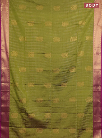 Semi soft silk saree mehendi green and magenta pink with allover zari checks & buttas and zari woven border