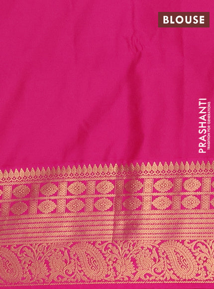 Semi soft silk saree green and pink with allover zari woven buttas and zari woven border