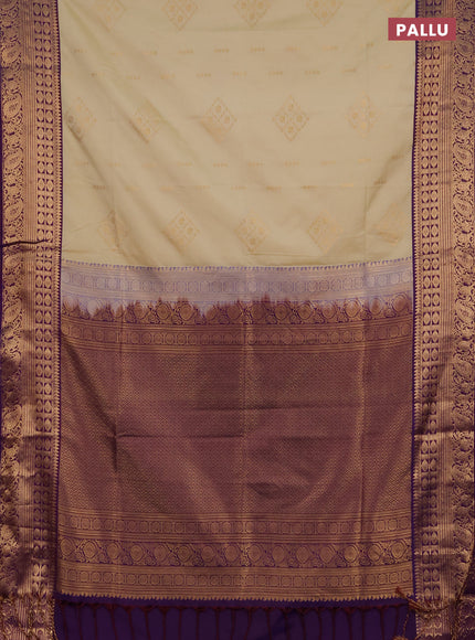 Semi soft silk saree beige and purple with allover zari woven buttas and zari woven border