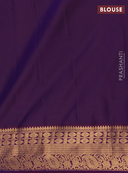 Semi soft silk saree green and purple with allover zari woven buttas and zari woven border