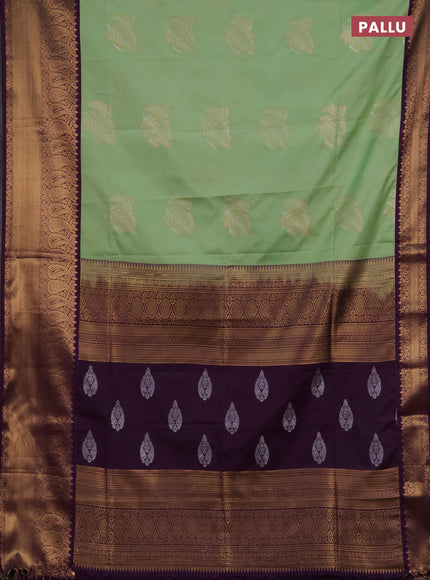 Semi soft silk saree mild pista green and purple with allover silver & gold zari woven buttas and zari woven border