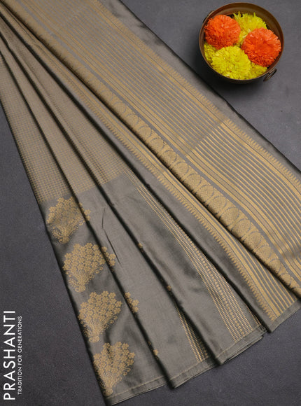 Semi soft silk saree grey shade with allover small silver zari checked pattern and long zari woven border