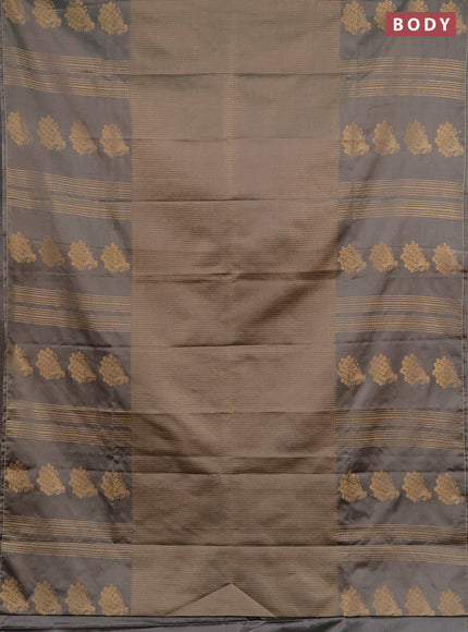 Semi soft silk saree grey shade with allover small silver zari checked pattern and long zari woven border