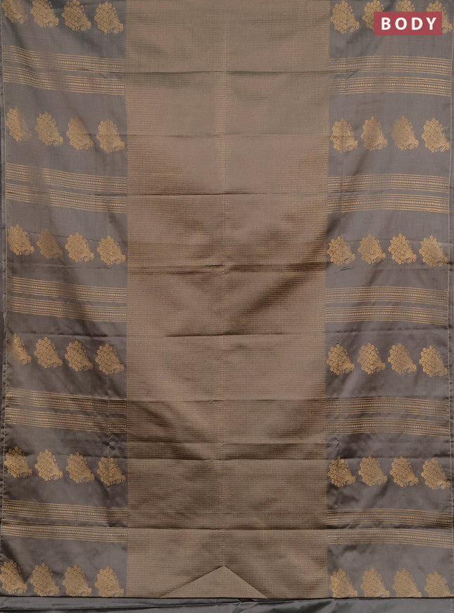 Semi soft silk saree grey shade with allover small silver zari checked pattern and long zari woven border
