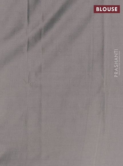 Semi soft silk saree grey shade with allover small silver zari checked pattern and long zari woven border