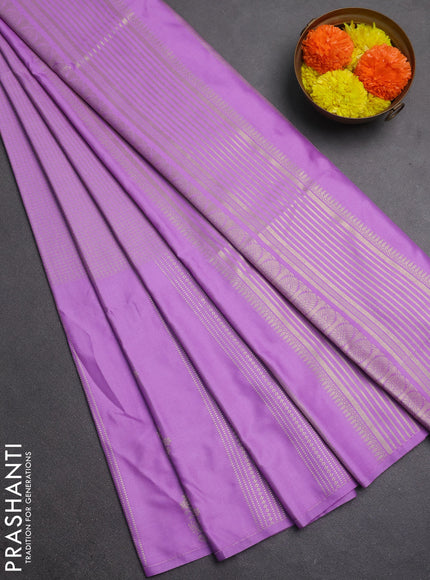 Semi soft silk saree lavender with allover small silver zari checked pattern and long zari woven border