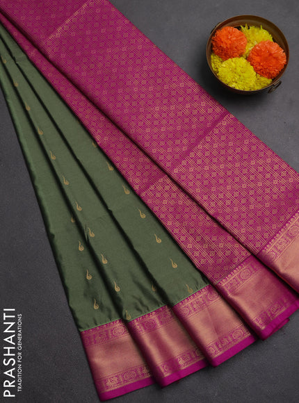 Semi soft silk saree pastel green and magenta pink with allover zari woven buttas and zari woven border