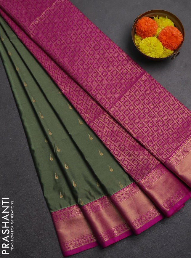 Semi soft silk saree pastel green and magenta pink with allover zari woven buttas and zari woven border