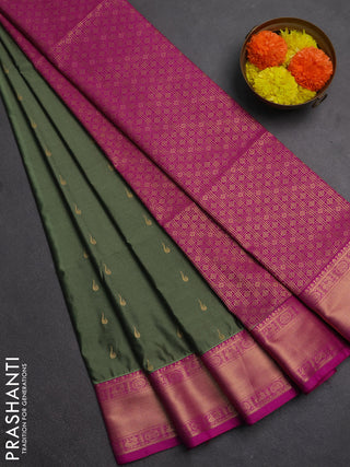 Semi soft silk saree pastel green and magenta pink with allover zari woven buttas and zari woven border