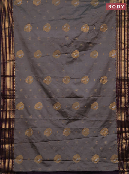 Semi soft silk saree grey and deep purple with allover zari woven buttas and zari woven border