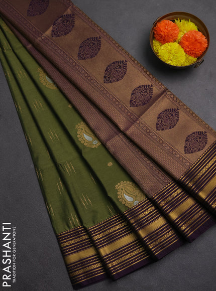 Semi soft silk saree sap green and deep purple with allover zari woven buttas and zari woven border