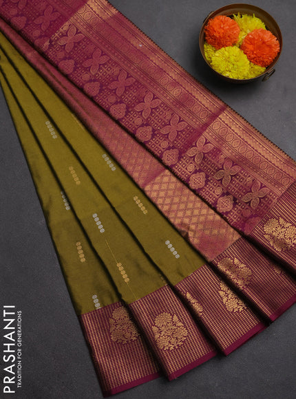 Semi soft silk saree mehendi green and dark magenta pink with allover silver & gold zari woven buttas and zari woven butta border
