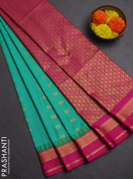 Semi soft silk saree teal green and pink with allover zari weaves & buttas and rettapet zari woven border