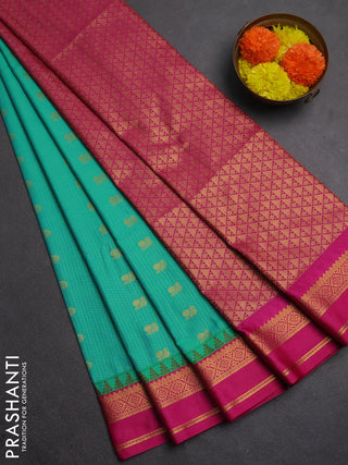 Semi soft silk saree teal green and pink with allover zari weaves & buttas and rettapet zari woven border