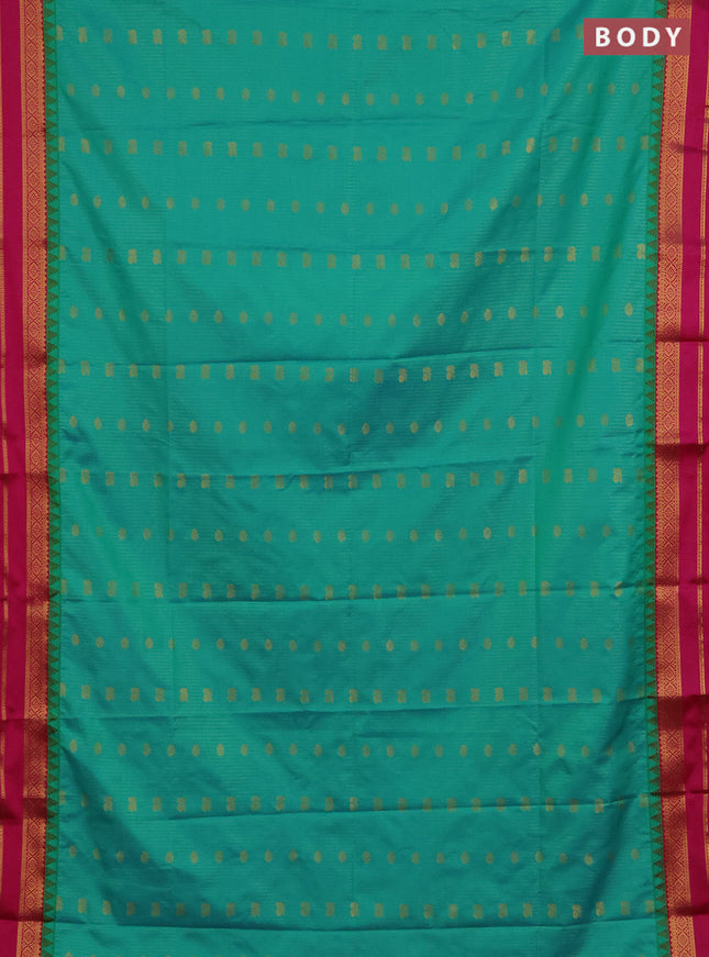 Semi soft silk saree teal green and pink with allover zari weaves & buttas and rettapet zari woven border