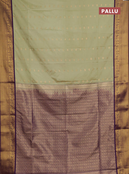 Semi soft silk saree pastel green and purple with allover zari woven buttas and zari woven border