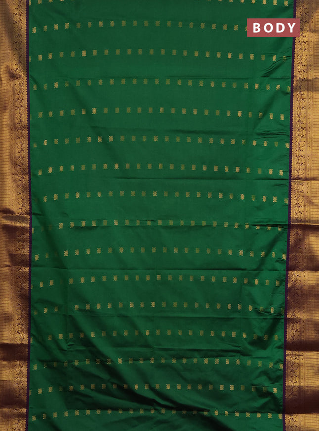 Semi soft silk saree green and purple with allover zari woven buttas and zari woven border