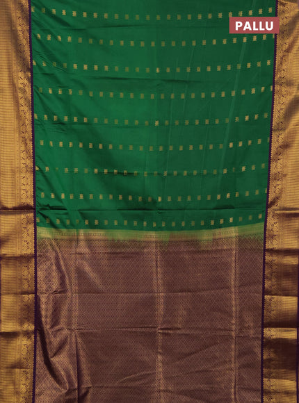 Semi soft silk saree green and purple with allover zari woven buttas and zari woven border