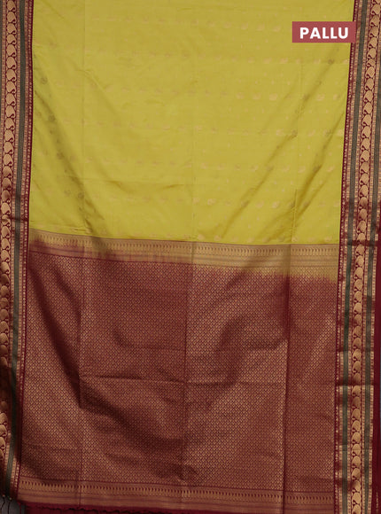 Semi soft silk saree pale yellow and maroon with allover zari woven buttas and zari woven border