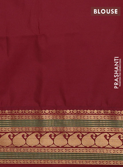 Semi soft silk saree pink and maroon with allover zari woven buttas and zari woven border