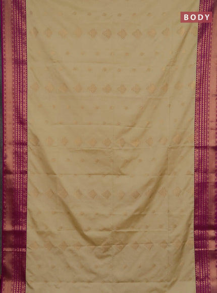 Semi soft silk saree beige and magenta pink with allover zari woven buttas and zari woven border
