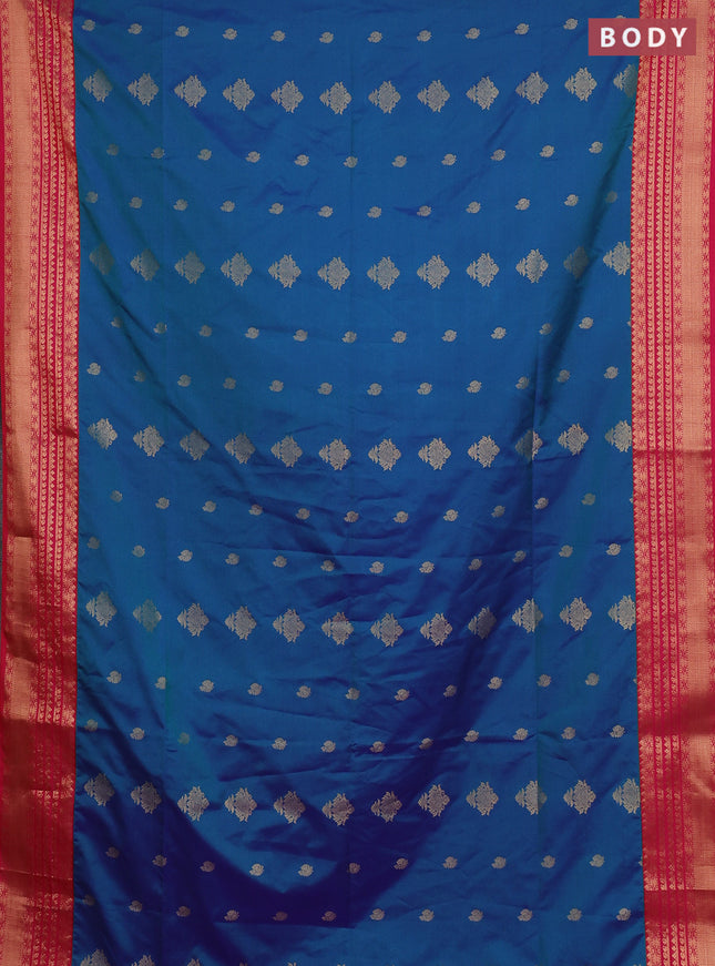 Semi soft silk saree peacock blue and pink with allover zari woven buttas and zari woven border
