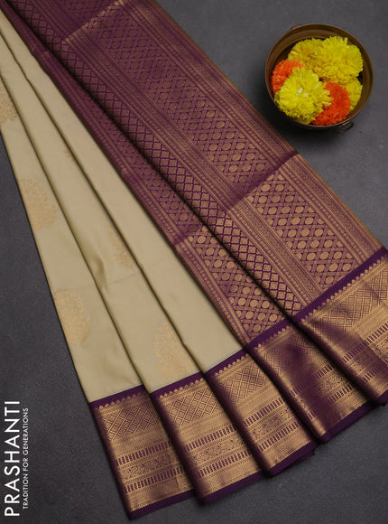 Semi soft silk saree beige and purple with zari woven buttas and zari woven border