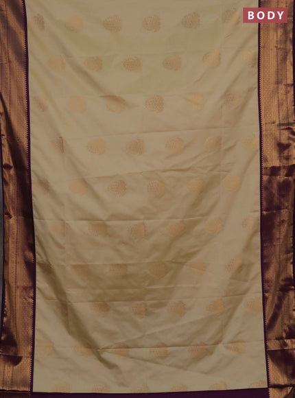 Semi soft silk saree beige and purple with zari woven buttas and zari woven border
