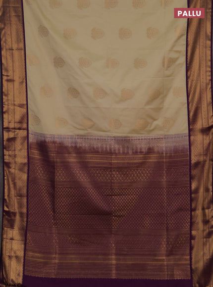 Semi soft silk saree beige and purple with zari woven buttas and zari woven border