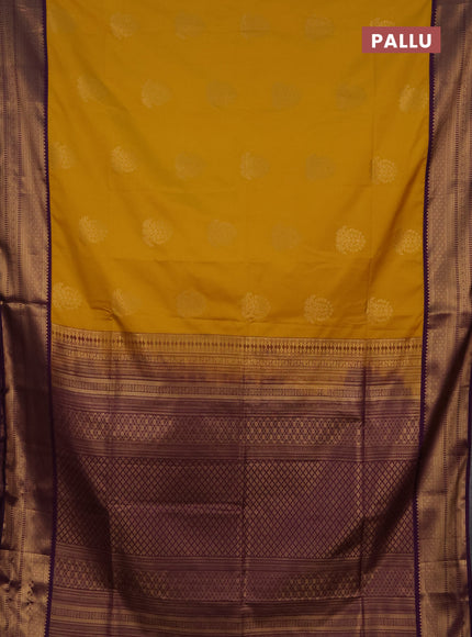 Semi soft silk saree mustard yellow and purple with zari woven buttas and zari woven border