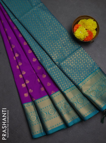 Semi soft silk saree magenta pink and teal green with allover zari woven buttas and zari woven border